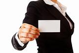 smiling modern business woman holding blank business card
