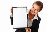 smiling modern business woman holding blank clipboard
