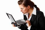  modern business woman amazingly looks in laptops screen
