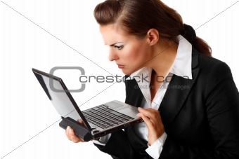  modern business woman amazingly looks in laptops screen

