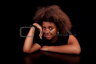 beautiful black  woman, isolated on black background.studio shot.