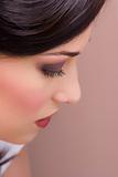 closeup brunette young lady get ready for the event by makeup ar