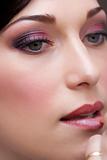closeup brunette young lady prepare for the event by makeup art