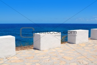Mediterranean sea coastal view white milestones