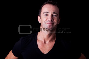 Portrait of a  handsome man,  isolated on black background. Studio shot.