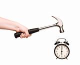Alarm Clock and hammer in hand