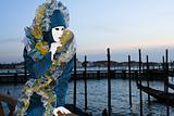 A masked woman in Venice