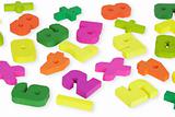 Multi-colored wooden toy figures on white