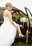 Sexual bride and groom in car