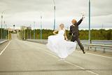 Newly married pair jumps on highway