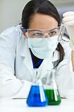 Female Scientist or Woman Doctor With Test Tube In Laboratory