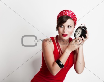 Girl holding a clock