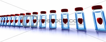 Medical bottles of clear glass with red hearts inside