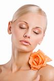 closed eyes girl with wet rose