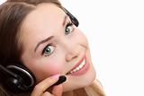 Pretty caucasian woman with headset smiling during a telephone c