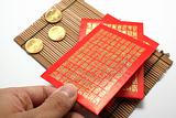 red envelopes and coins for Chinese New Year
