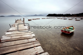 wooden pier and boats