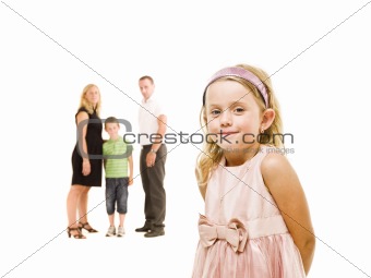 Young girl in front of her family
