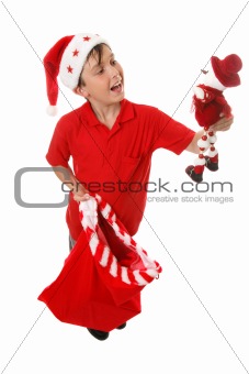Boy with toy Christmas sack