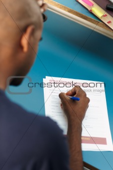 student filling application form