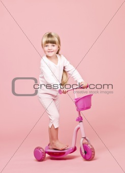 Young girl with a scooter