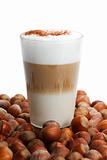latte macchiato between a lot of hazelnuts