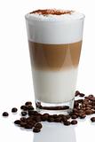 latte macchiato with cocoa and beans on white
