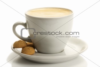 white cup with coffee and amarettini