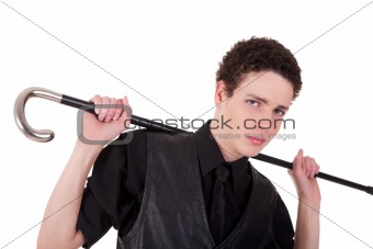 Young confident man holding a cane, isolated on white, studio shot