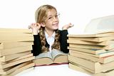 little student blond braided girl smiling with stacked books