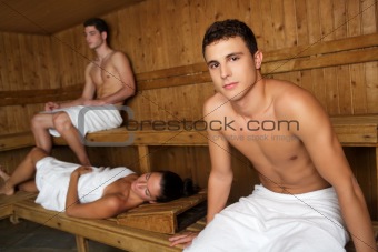 Sauna spa therapy young group in wooden room
