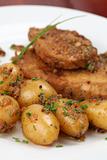 Roast pork with baby potatoes