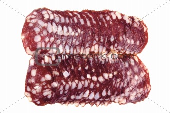 Slices of smoked sausage isolated on white