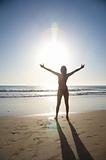 beach woman greeting sun
