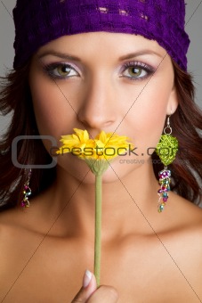Woman Smelling Flower