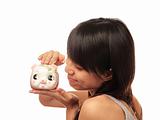 chinese girl with piggy bank