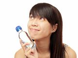 chinese girl looking up with bottle water