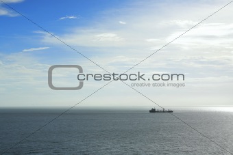 alone ship in blue sea