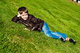 Little boy Lying Down on the  grass