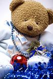 Soft bear with Christmas decorations 