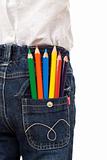 Colored pencils in child back pocket
