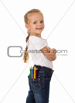Little proud girl with pencils in her pocket