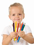 Little girl with colored pencils