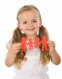 Little girl holding paper people - family concept