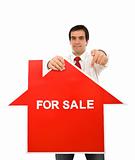 Real estate concept with agent showing sign
