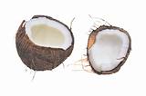 Two halves of cracked coconut on white background