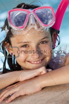 Happy Girl Child In Swimming Pool with Goggles and Snorkel