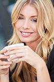 Beautiful Blond Woman Drinking Coffee