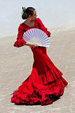 Traditional Woman Spanish Flamenco Dancer In Red Dress With Fan