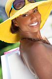 Beautiful African American Woman Smiling With Shopping Bags